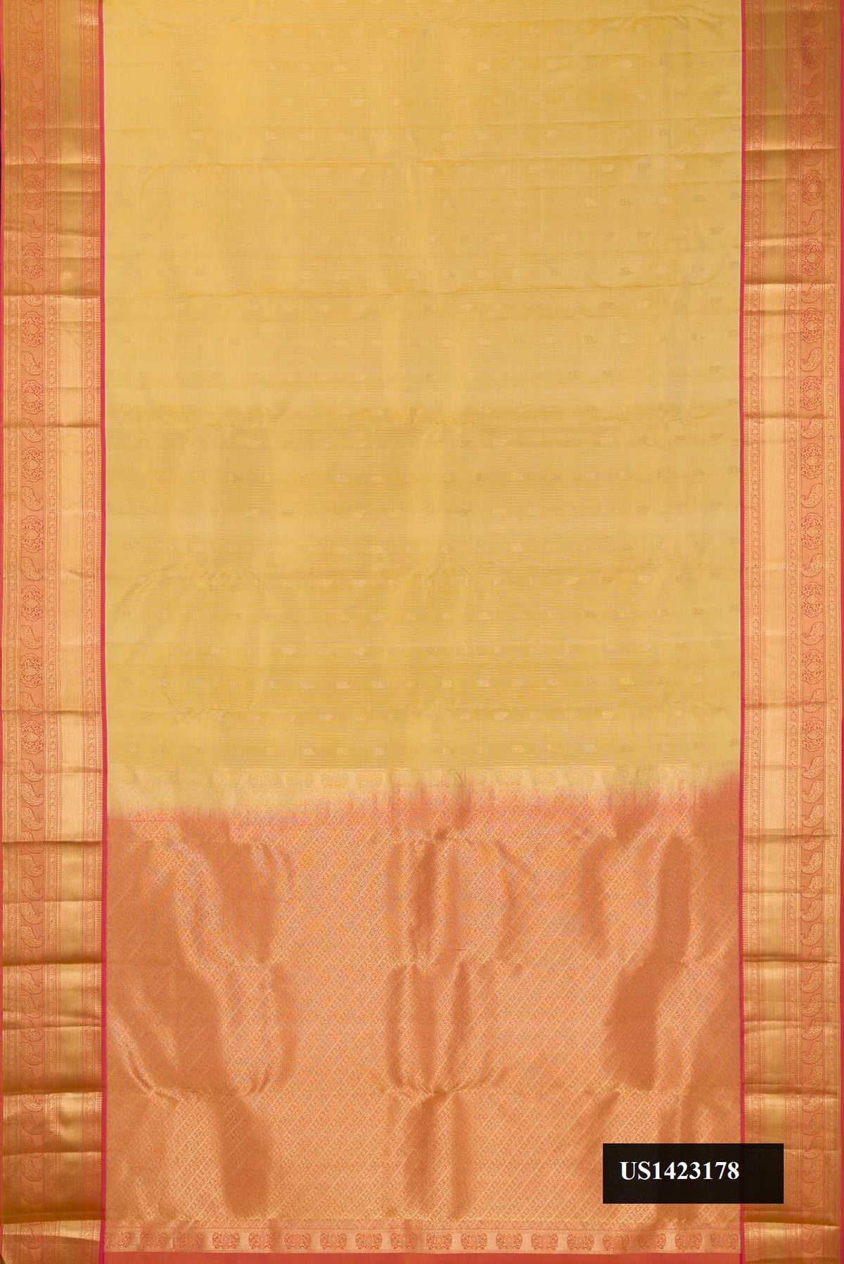 Beige Dual Tone Kanchipuram Silk Saree with Zari Butta on the body and Zari Border.  displayed on a mannequin