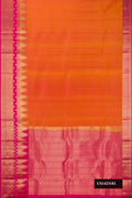 Mustard Dual Tone Kanchipuram Silk Saree with Zari Butta on the body and Temple Border.  displayed on a mannequin