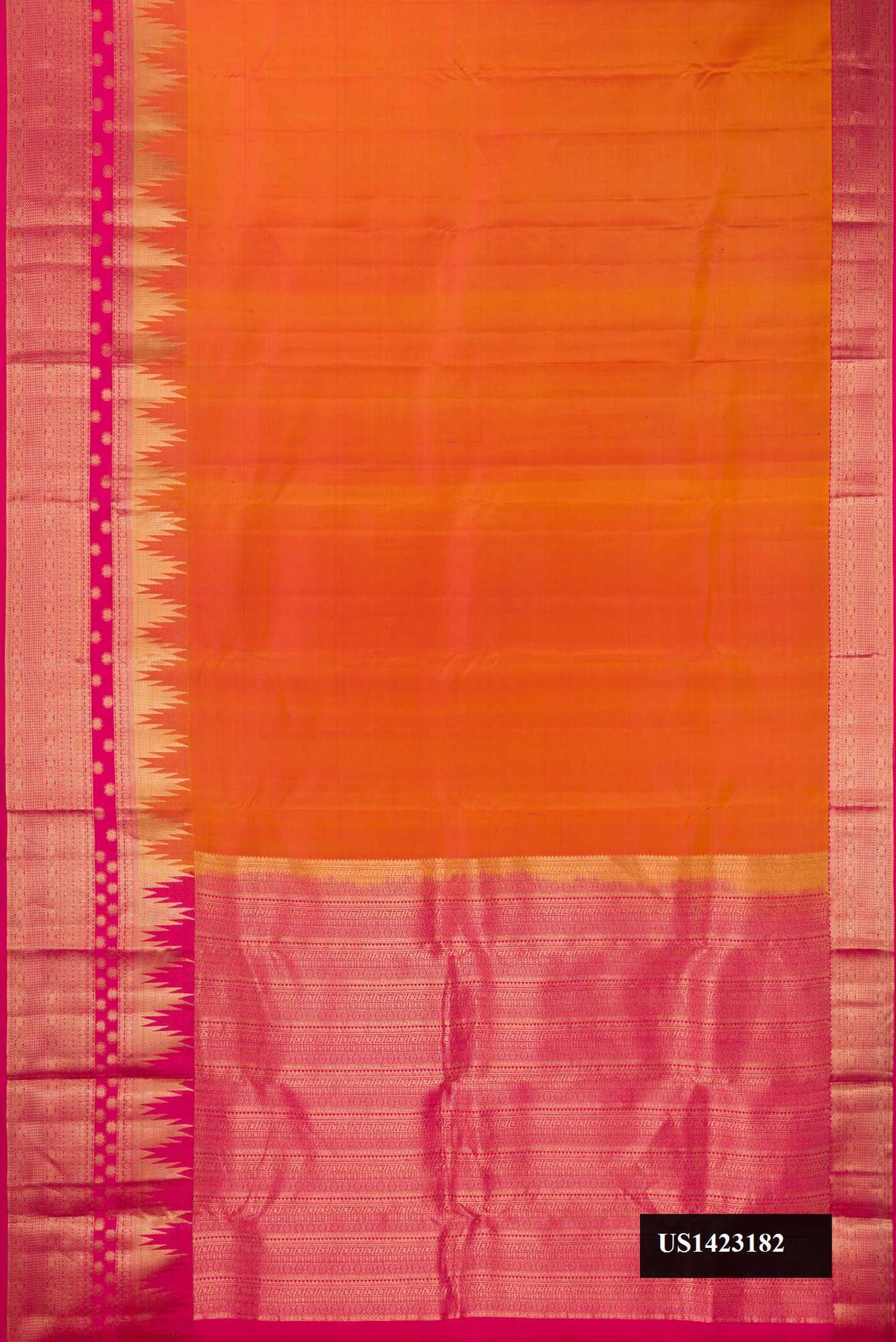Mustard Dual Tone Kanchipuram Silk Saree with Zari Butta on the body and Temple Border.  displayed on a mannequin