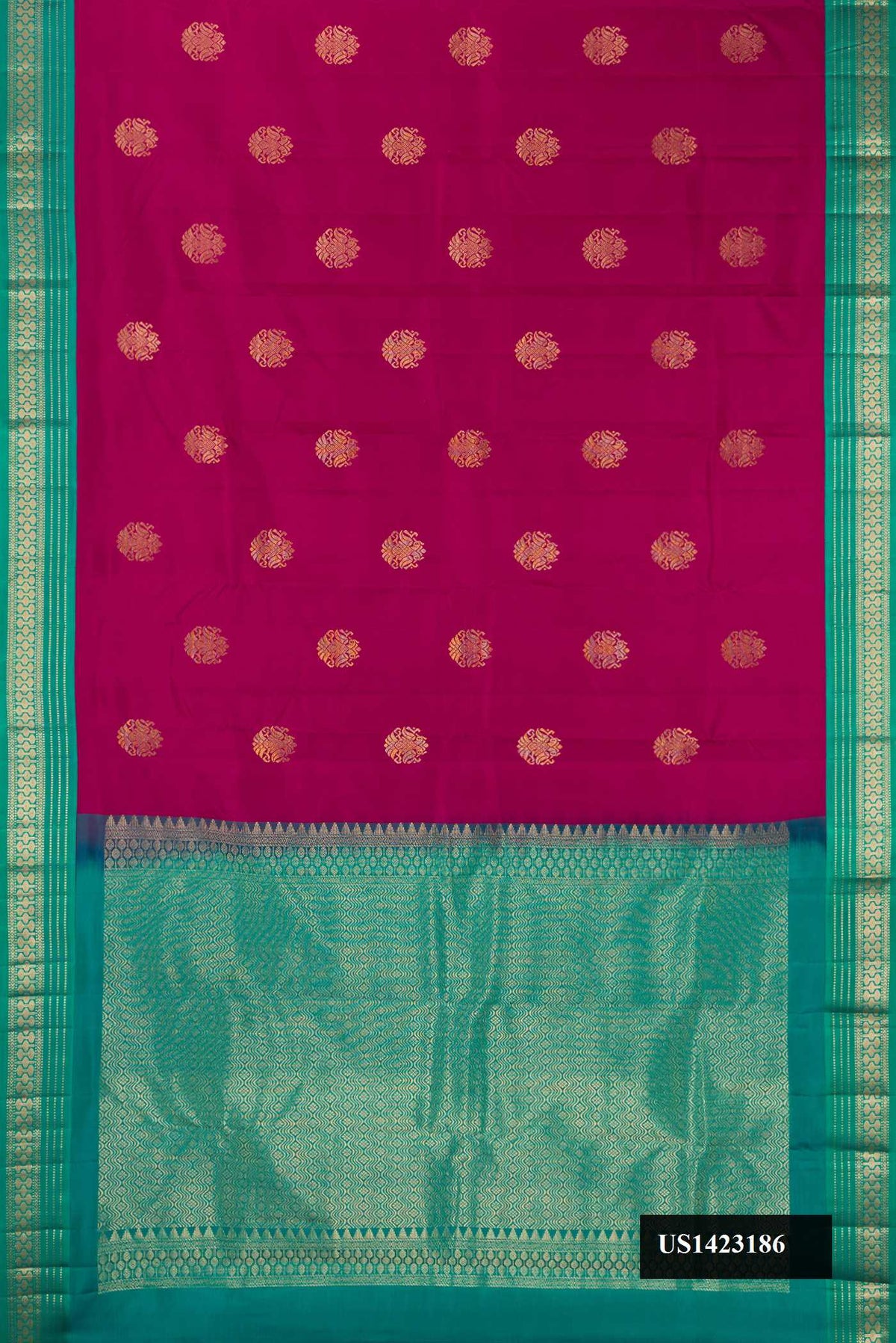 Purple Dual Tone Kanchipuram Silk Saree with Zari Butta on the body and Zari Border.  displayed on a mannequin