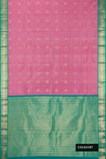 Pink Dual Tone Kanchipuram Silk Saree with Zari Butta on the body and Zari Border.  displayed on a mannequin