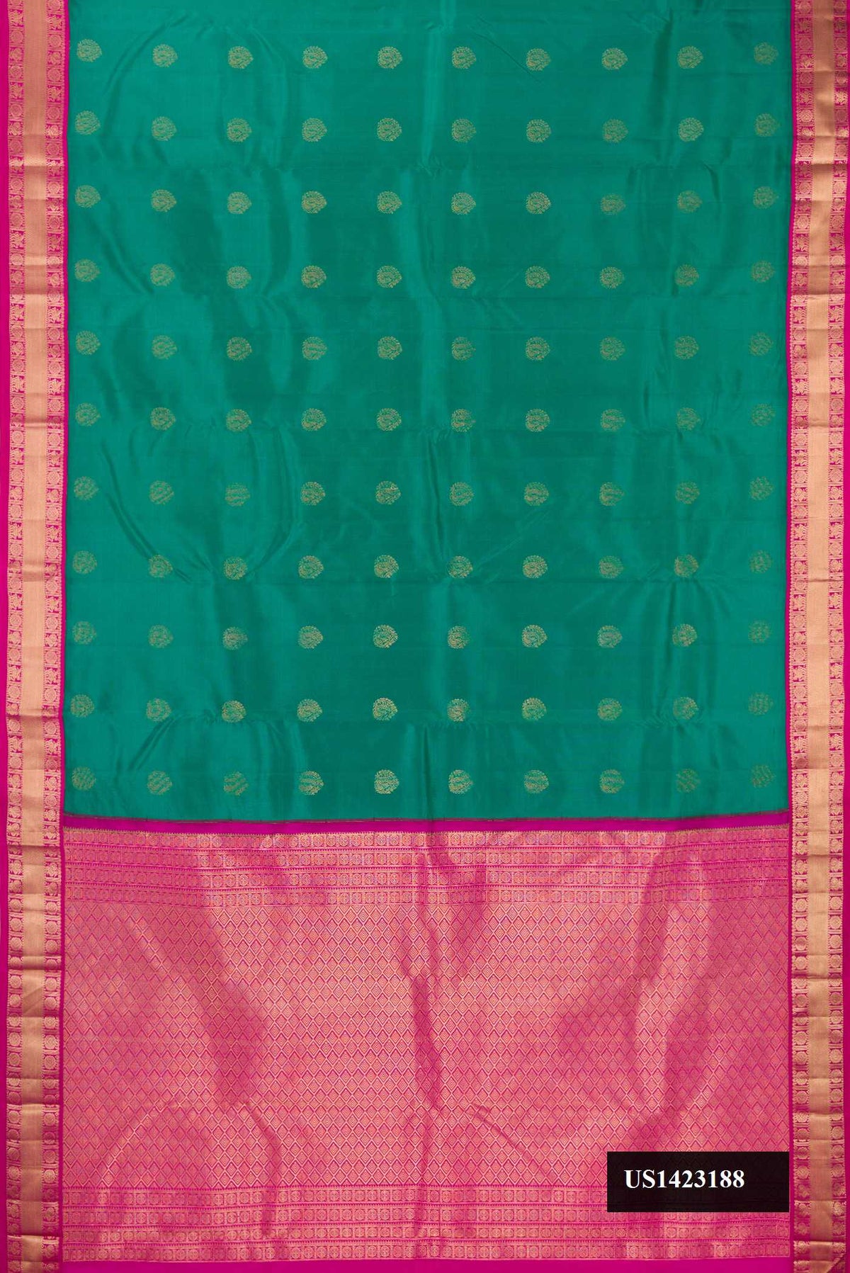 Sea Green Dual Tone Kanchipuram Silk Saree with Zari Butta on the body and Zari Border.  displayed on a mannequin
