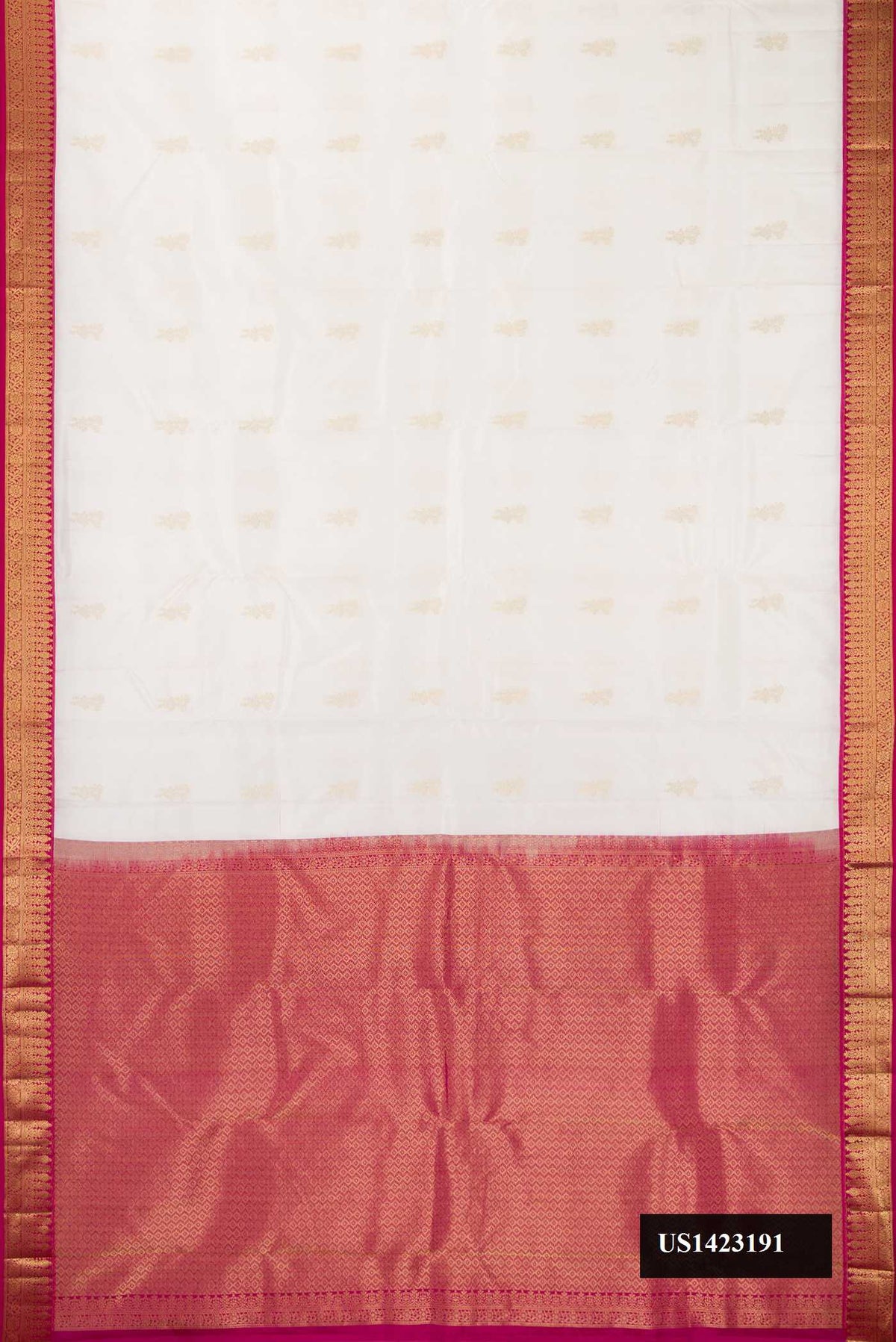 White Dual Tone Kanchipuram Silk Saree with Zari Butta on the body and Zari Border.  displayed on a mannequin