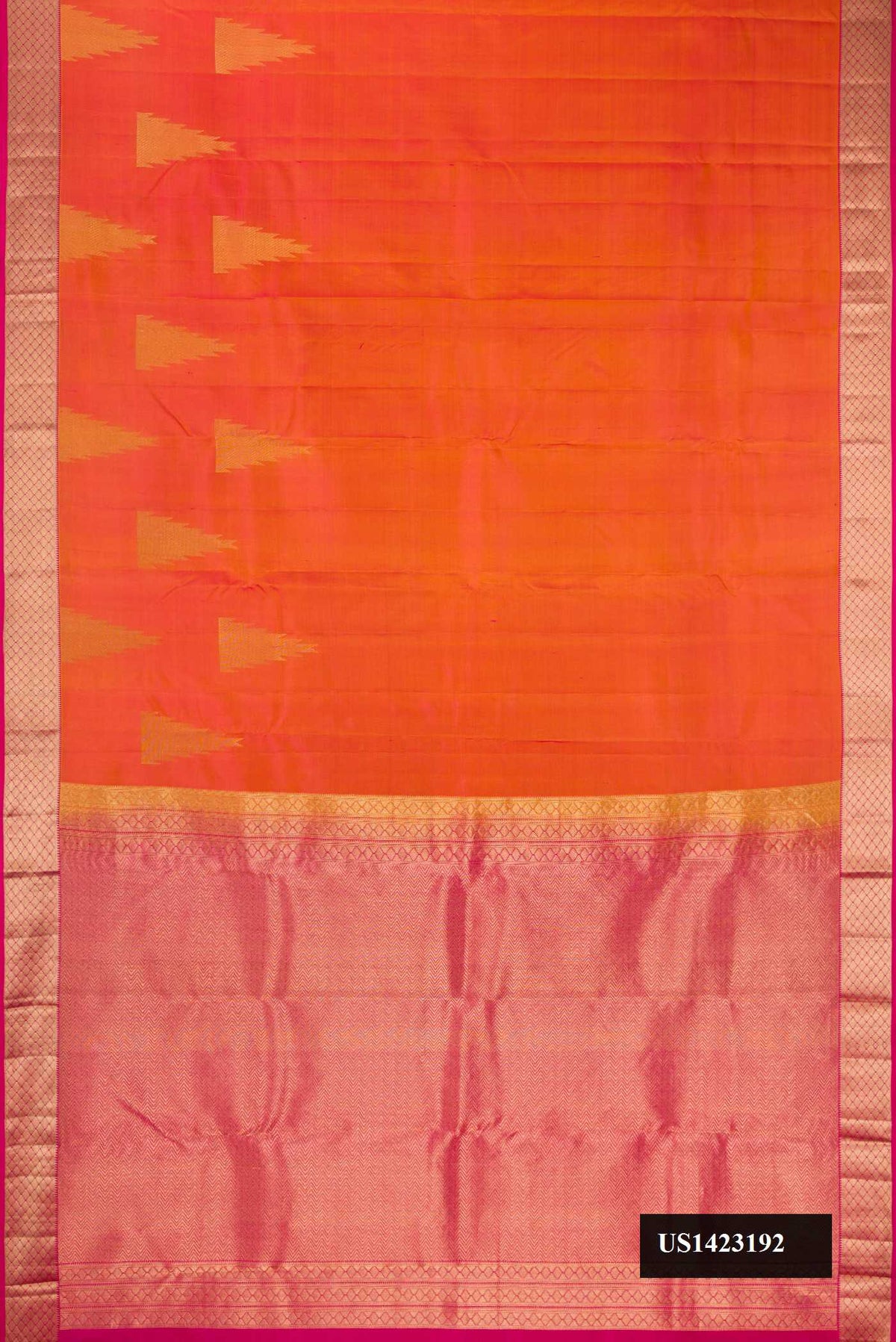 Coral Dual Tone Kanchipuram Silk Saree with Zari Butta on the body and Zari Border.  displayed on a mannequin