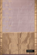 Rose Gold Dual Tone Kanchipuram Silk Saree with Zari Butta on the body and Zari Border.  displayed on a mannequin