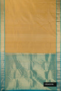 Sandal Dual Tone Kanchipuram Silk Saree with Zari Butta on the body and Zari Border.  displayed on a mannequin