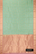 Pista Green Dual Tone Kanchipuram Silk Saree with Stripes on the body and Zari Border.  displayed on a mannequin