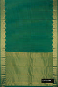 Bottle Green Dual Tone Kanchipuram Silk Saree with Stripes on the body and Fancy Border.  displayed on a mannequin