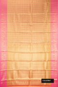 Gold Dual Tone Kanchipuram Tissue Silk Saree with Zari Brocade on the body and Zari Border.  displayed on a mannequin
