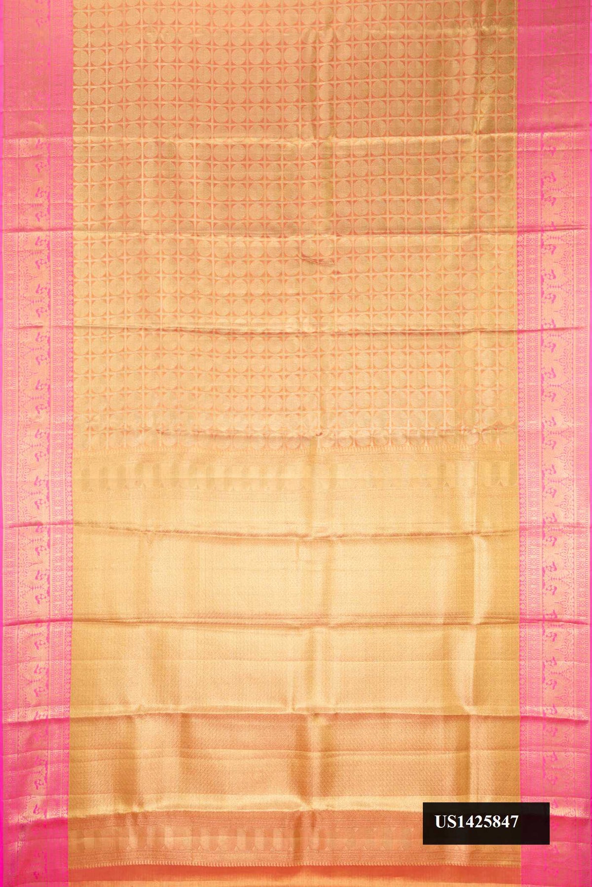Gold Dual Tone Kanchipuram Tissue Silk Saree with Zari Brocade on the body and Zari Border.  displayed on a mannequin