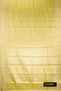 Pista Green Dual Tone Kanchipuram Tissue Silk Saree with Zari Brocade on the body and Zari Border.  displayed on a mannequin