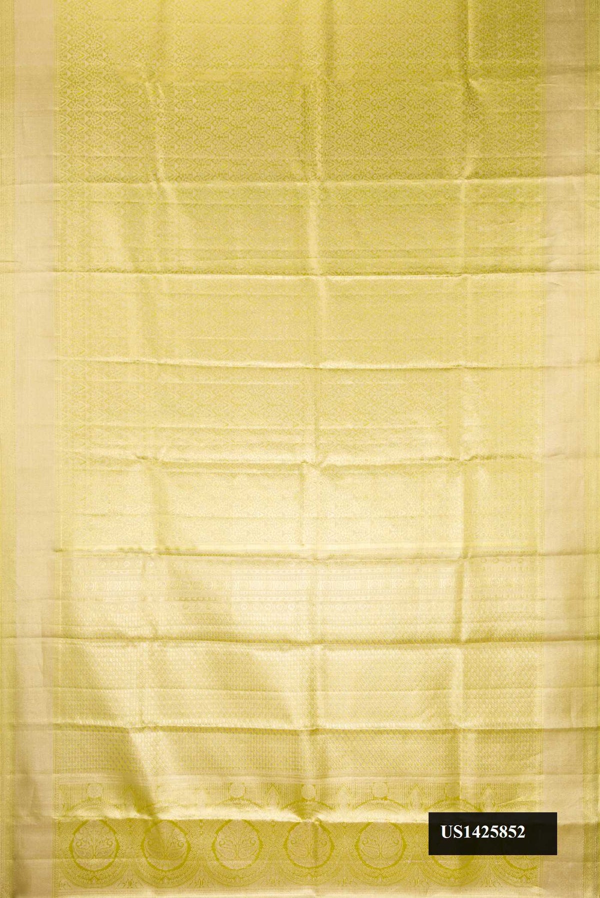 Pista Green Dual Tone Kanchipuram Tissue Silk Saree with Zari Brocade on the body and Zari Border.  displayed on a mannequin