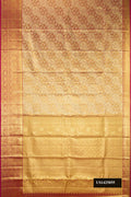 Gold Dual Tone Kanchipuram Tissue Silk Saree with Zari Brocade on the body and Zari Border.  displayed on a mannequin
