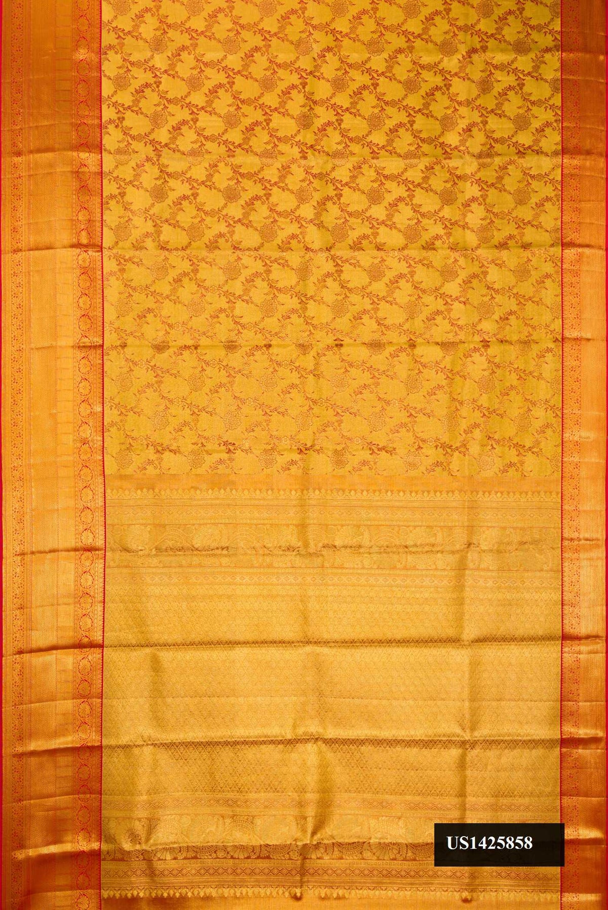 Gold Dual Tone Kanchipuram Tissue Silk Saree with Zari Brocade on the body and Zari Border.  displayed on a mannequin