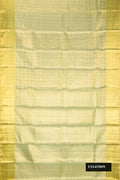 Pista Green Dual Tone Kanchipuram Tissue Silk Saree with Zari Brocade on the body and Zari Border.  displayed on a mannequin