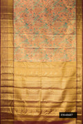 Peach Dual Tone Kanchipuram Tissue Silk Saree with Zari Brocade on the body and Zari Border.  displayed on a mannequin
