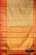 Green Dual Tone Kanchipuram Tissue Silk Saree with Zari Brocade on the body and Zari Border.  displayed on a mannequin