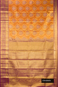 Orange Dual Tone Kanchipuram Tissue Silk Saree with Zari Brocade on the body and Zari Border.  displayed on a mannequin