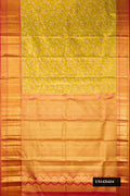 Mehandi Green Dual Tone Kanchipuram Tissue Silk Saree with Zari Brocade on the body and Zari Border.  displayed on a mannequin