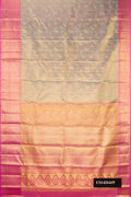 Sea Green Dual Tone Kanchipuram Tissue Silk Saree with Zari Brocade on the body and Zari Border.  displayed on a mannequin