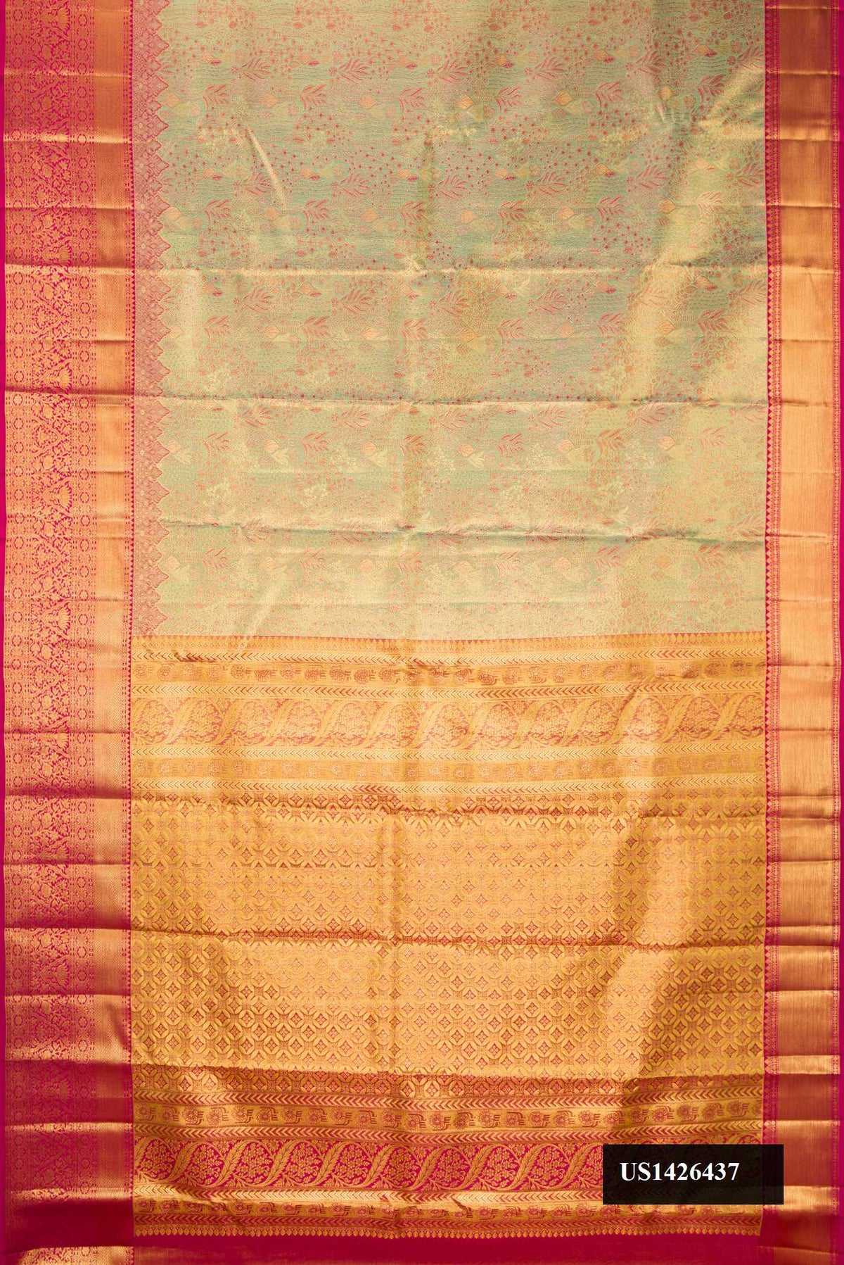 Pista Green Dual Tone Kanchipuram Tissue Silk Saree with Zari Brocade on the body and Zari Border.  displayed on a mannequin