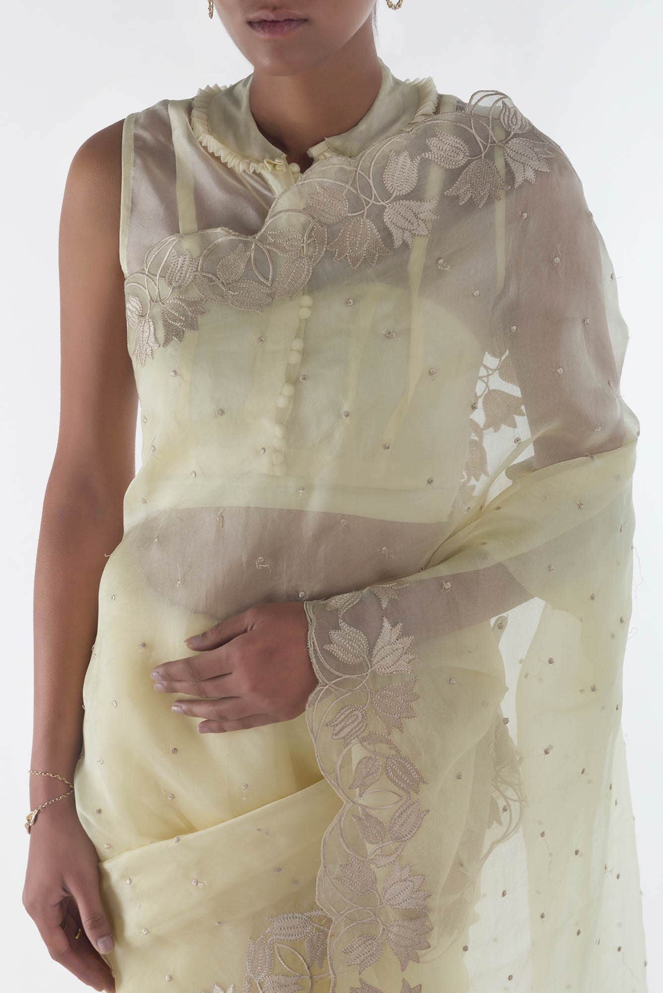 Piety of a Lili Cream floral design saree from Embroidered Romance Collection by Nalli