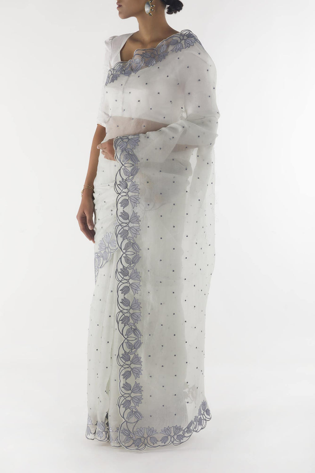 Piety of a Lili White floral design saree from Embroidered Romance Collection by Nalli