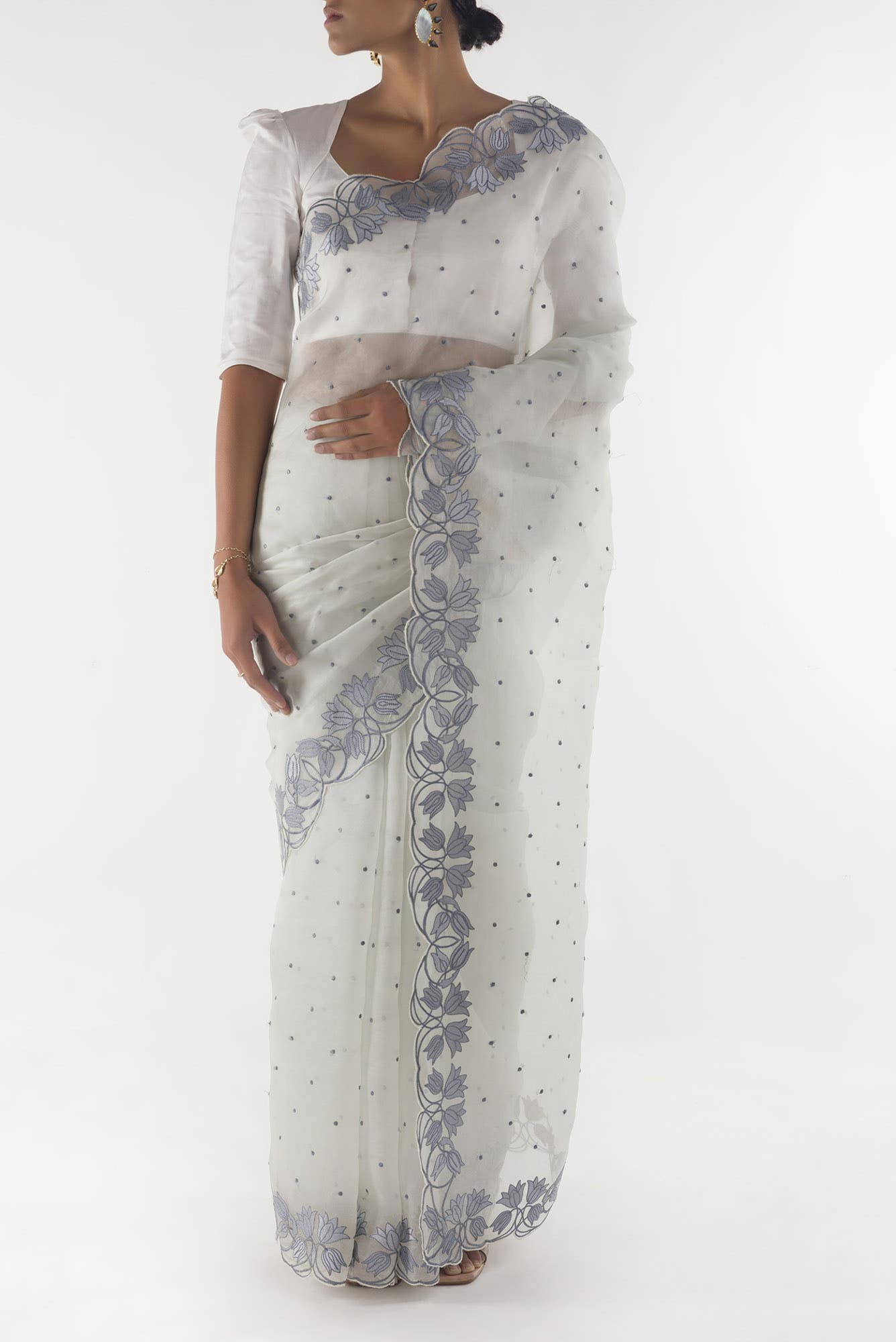 Piety of a Lili White floral design saree from Embroidered Romance Collection by Nalli