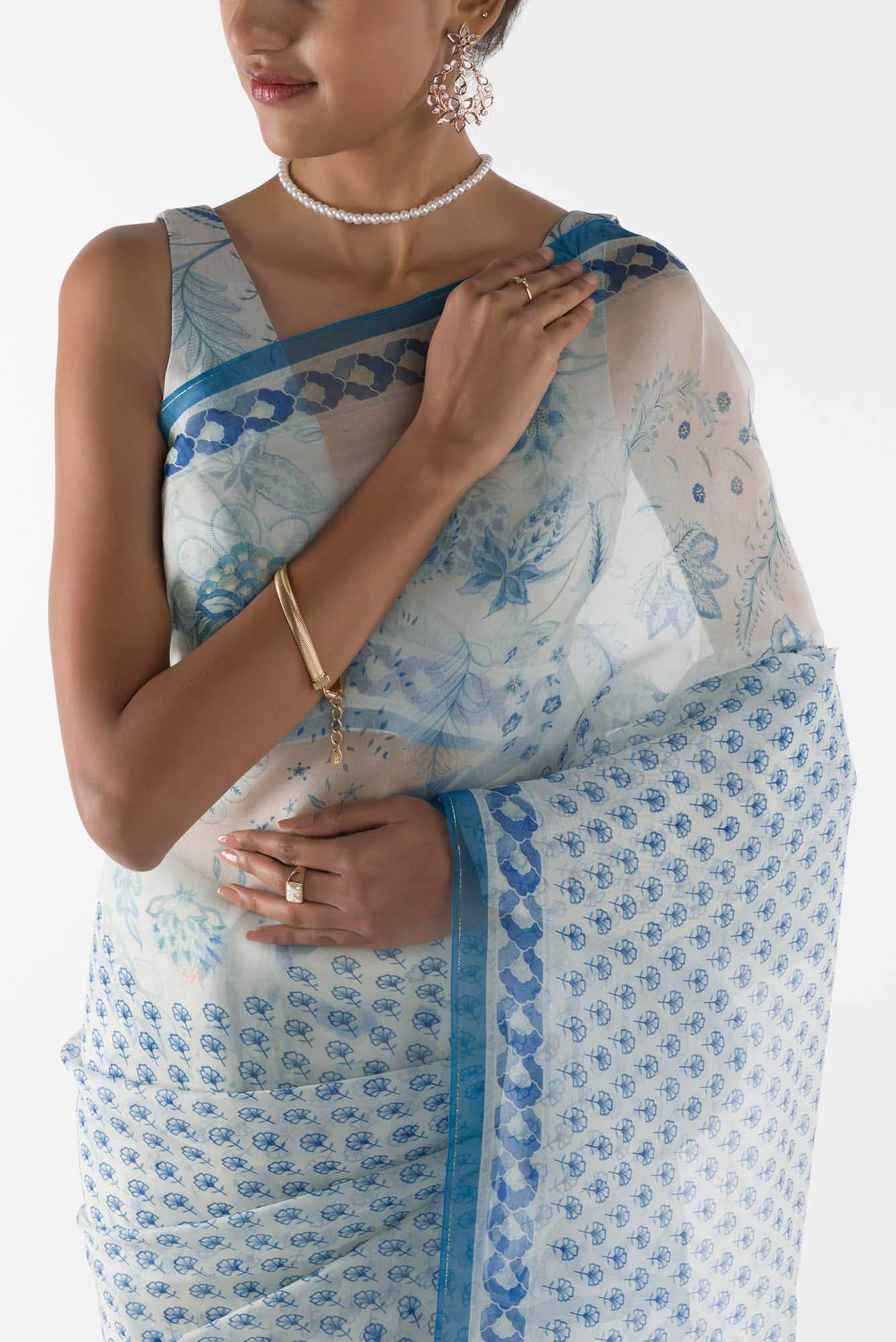 Pushpavalli - Ivory white Floral design saree from Chintz Collection, Designed by Nalli