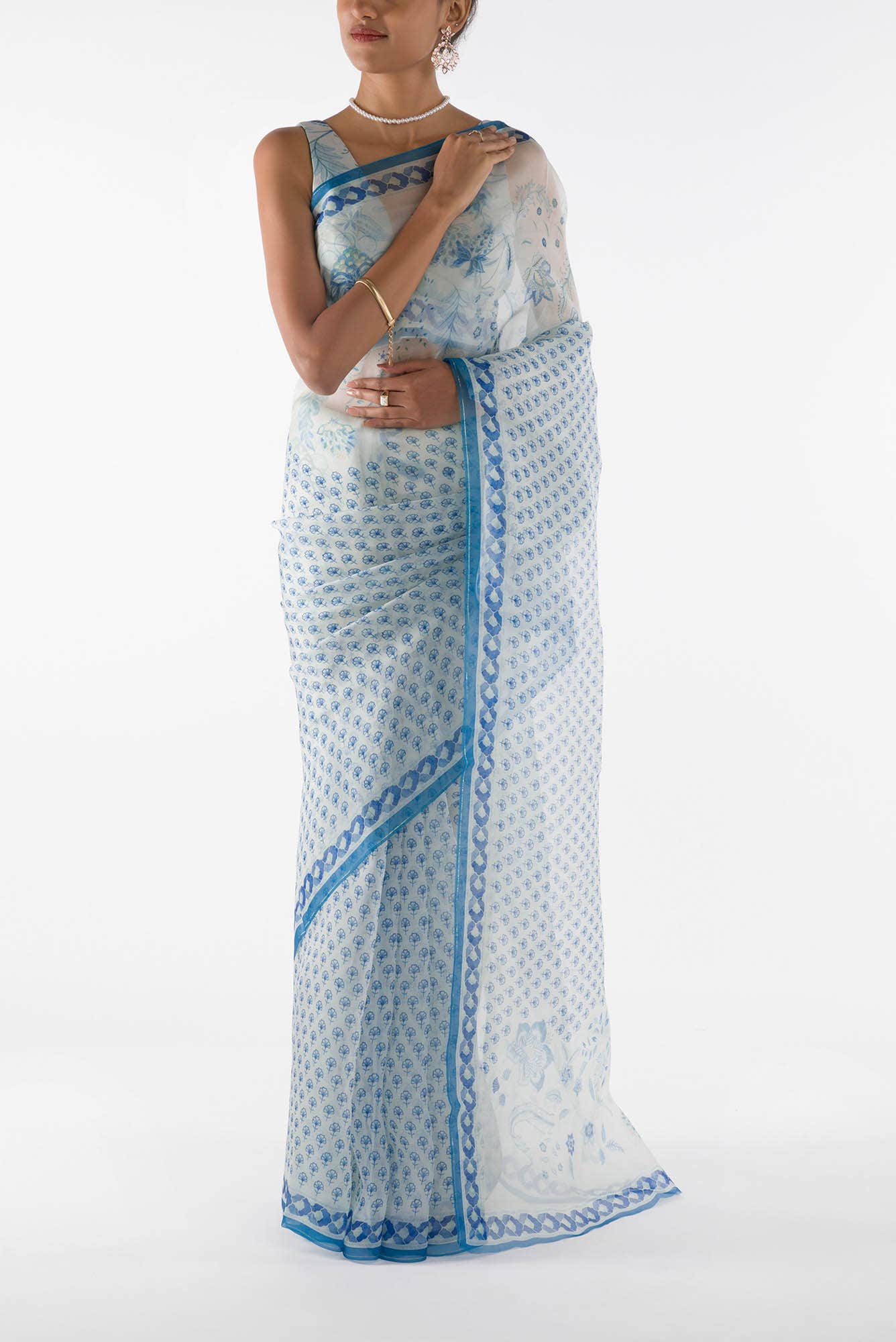Pushpavalli - Ivory white Floral design saree from Chintz Collection, Designed by Nalli