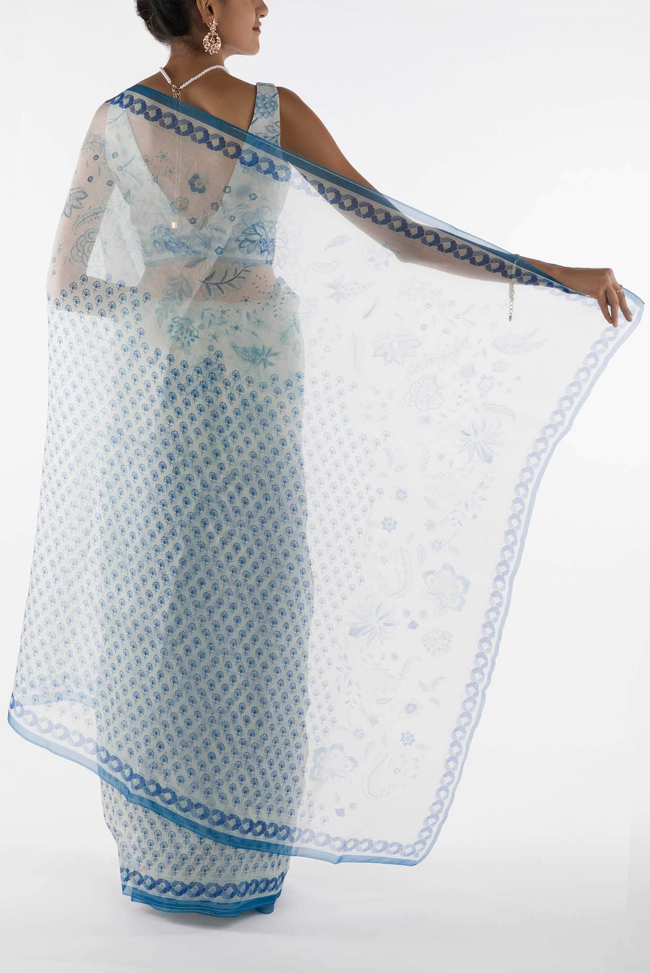 Pushpavalli - Ivory white Floral design saree from Chintz Collection, Designed by Nalli