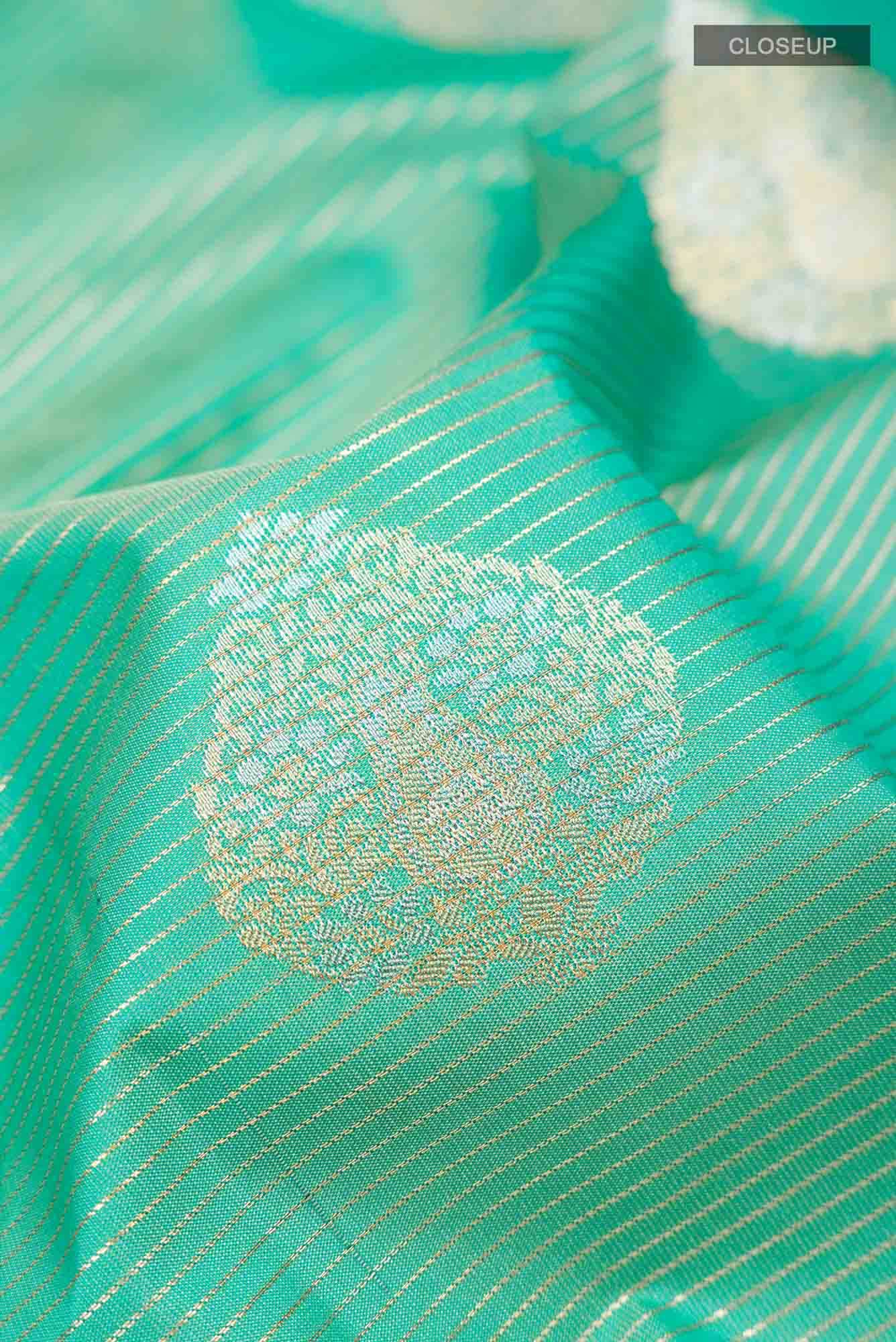 Sea Green Zari Butta Art Silk Saree with Rich Border