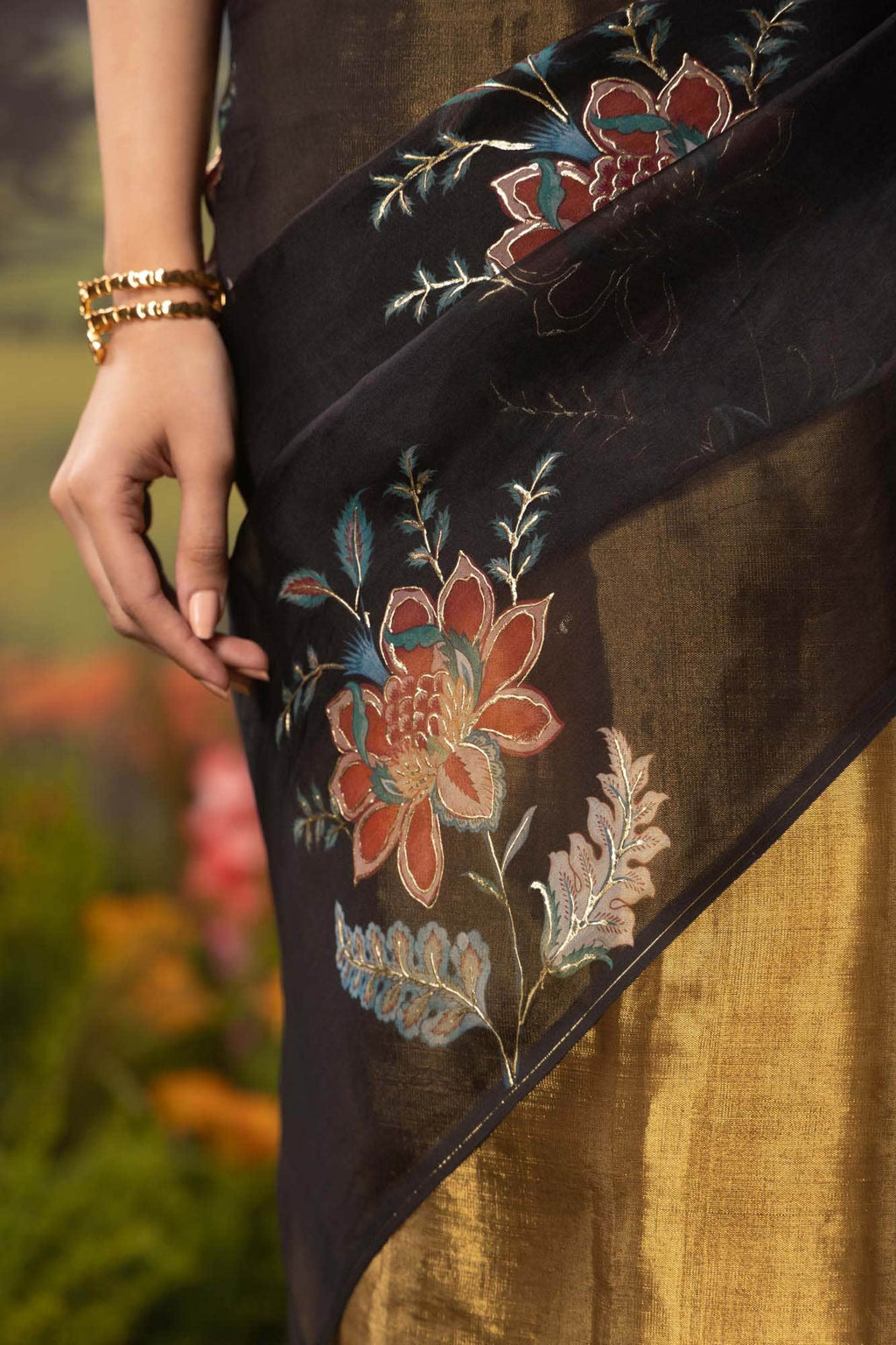Dawn and Dusk-Gold & Black Pure Organza Silk Saree
