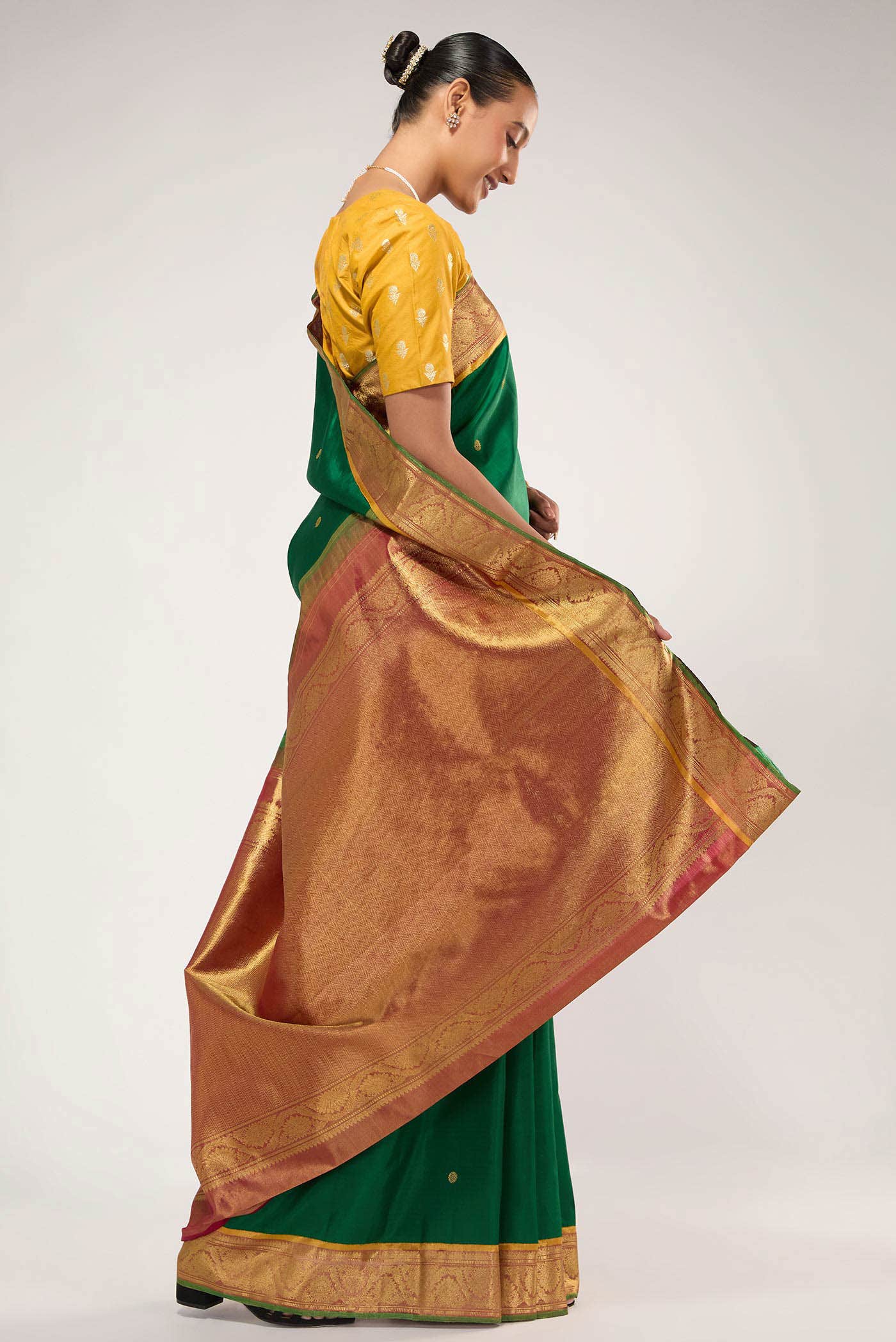 Suvarna-Pure Silk Pure Gold Zari Green Kanchipuram Saree