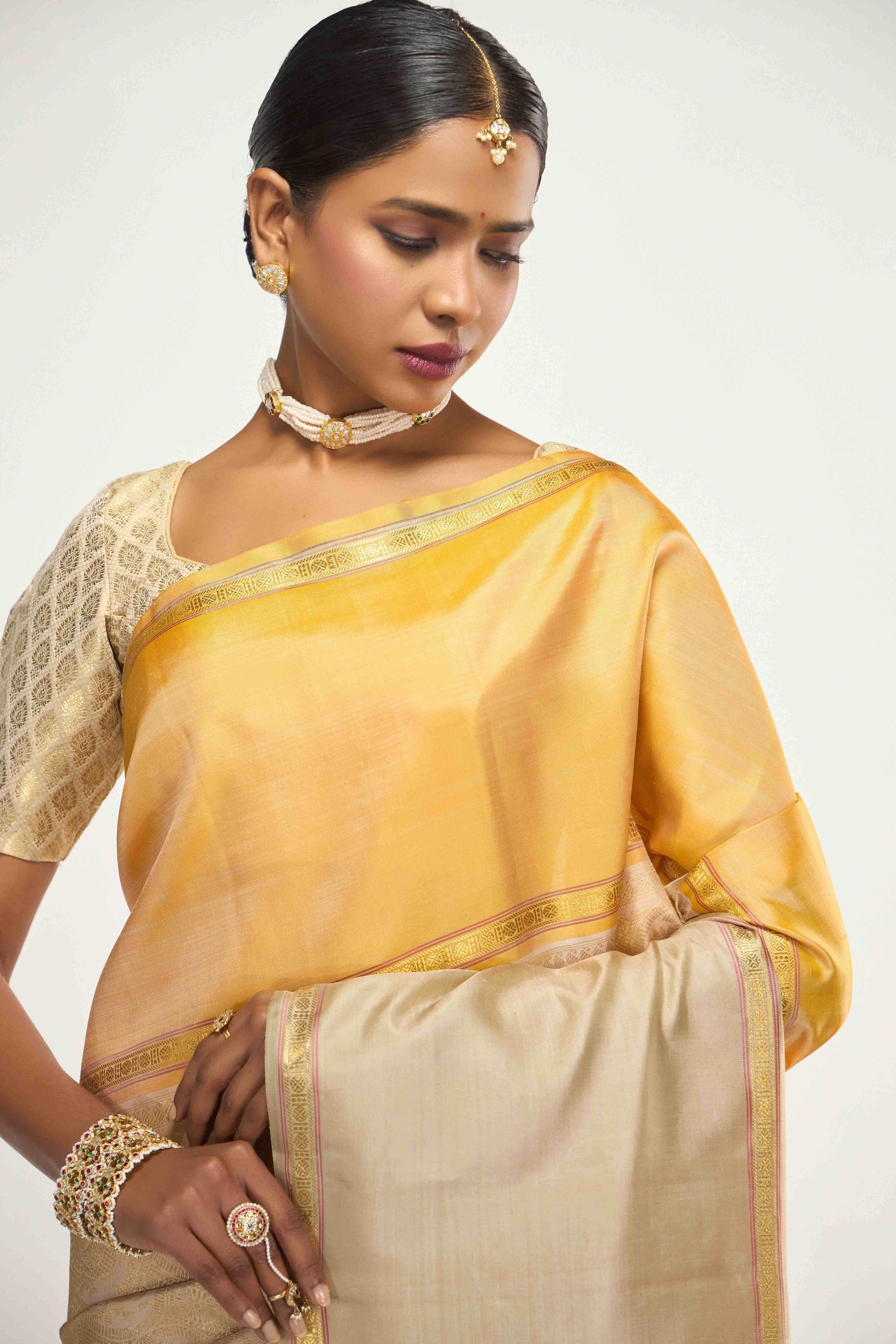 Nritya-Pure Silk Pure Gold Zari Off White Kanchipuram Saree