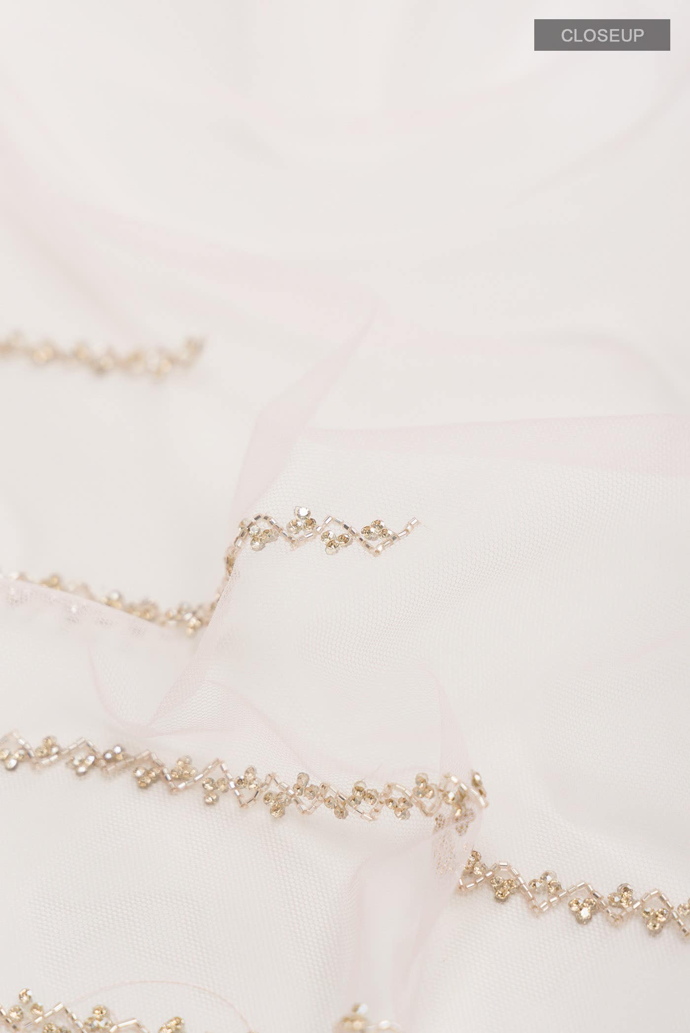 Peach Embroidery Net Saree