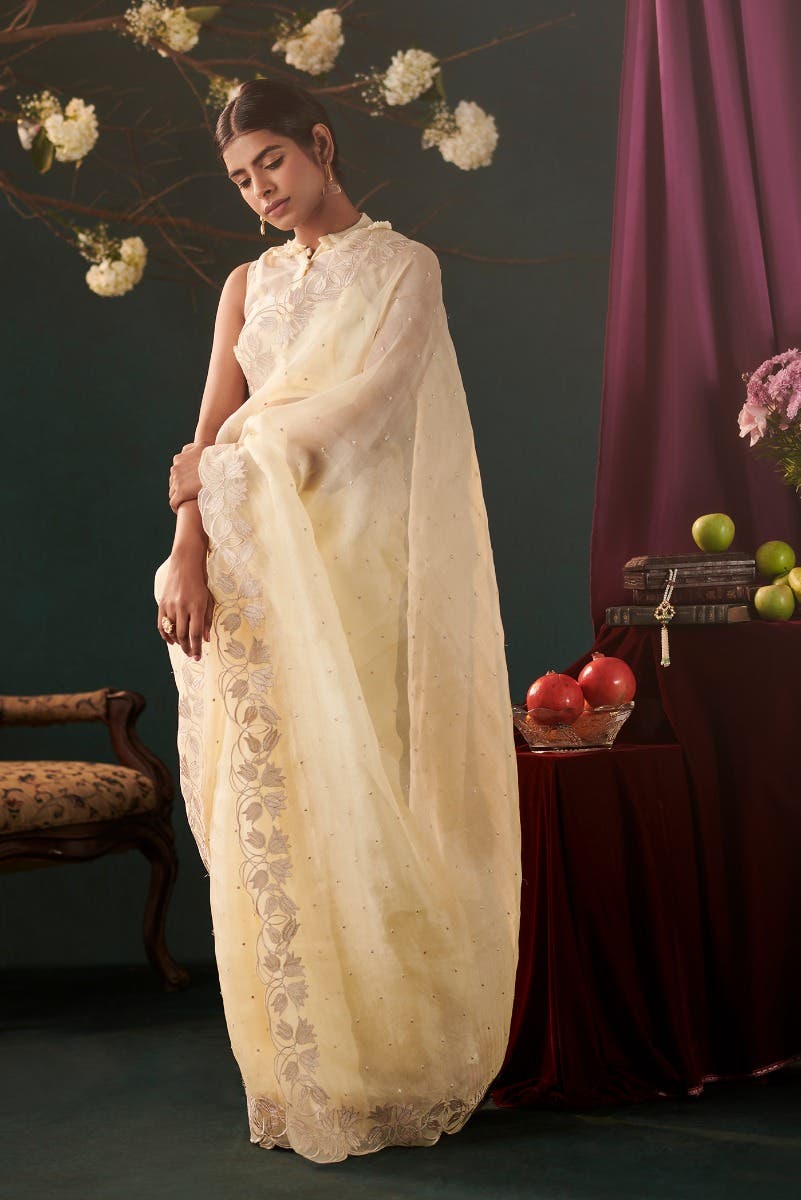 Piety of a Lili Cream floral design saree from Embroidered Romance Collection by Nalli