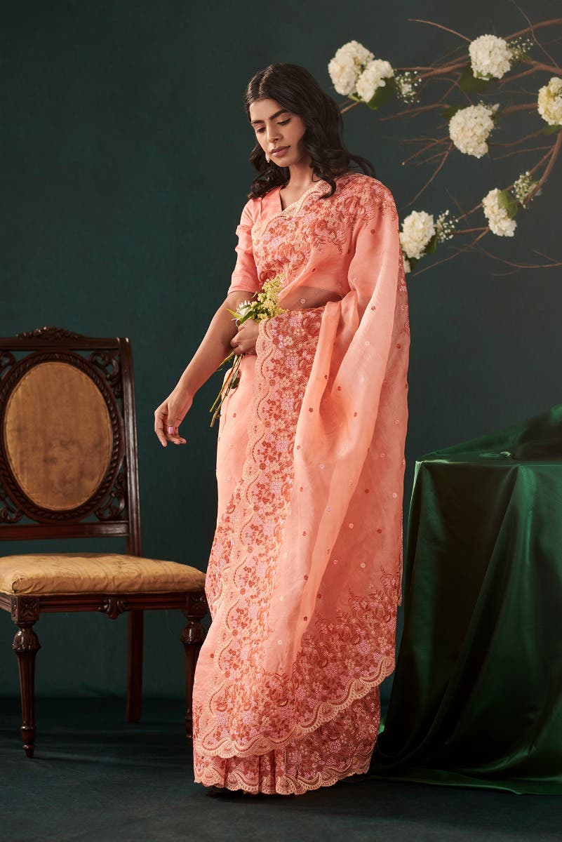 Lover’s lush Peach floral design saree from Embroidered Romance Collection by Nalli
