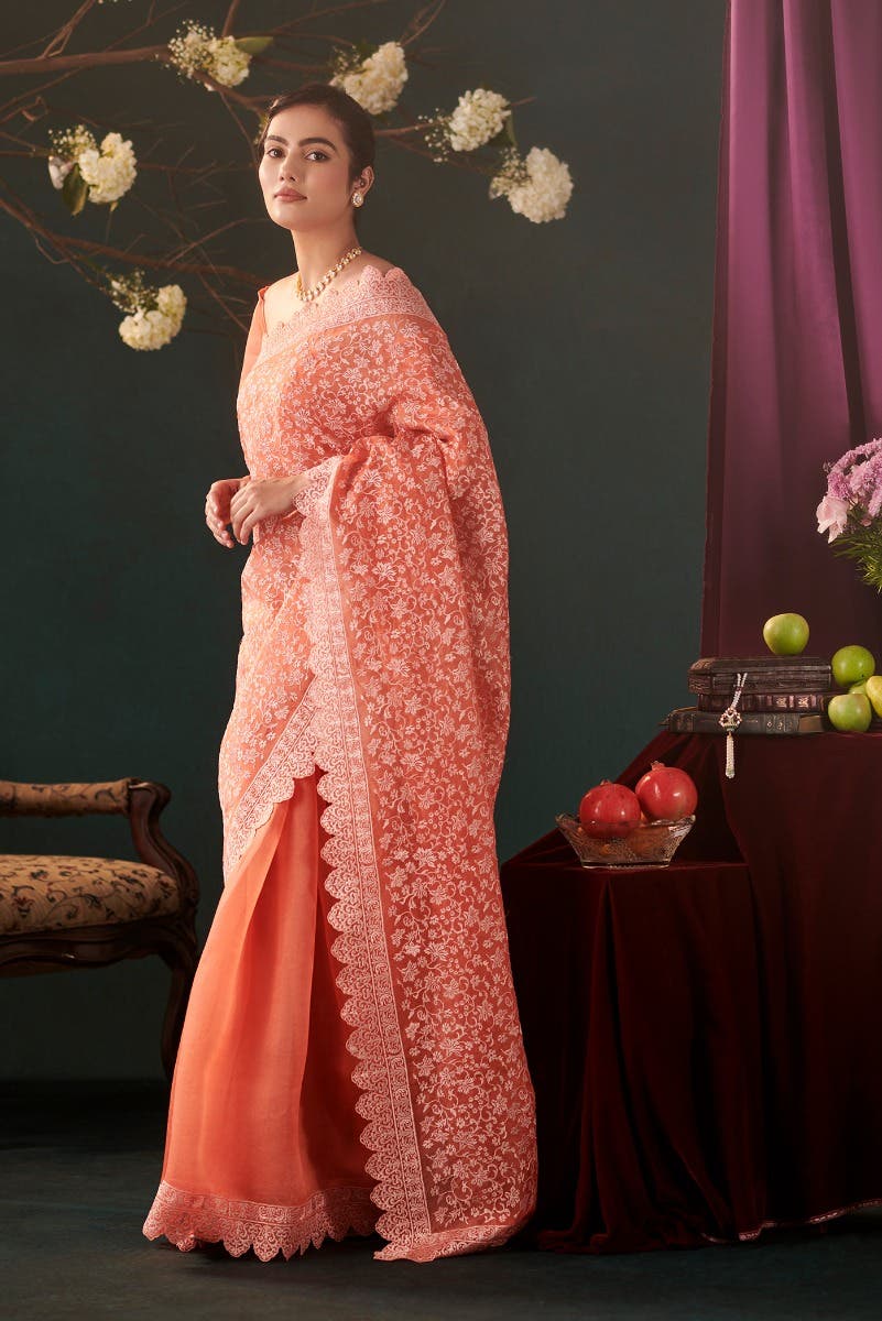 Iris waltz Orange floral design saree from Embroidered Romance Collection by Nalli