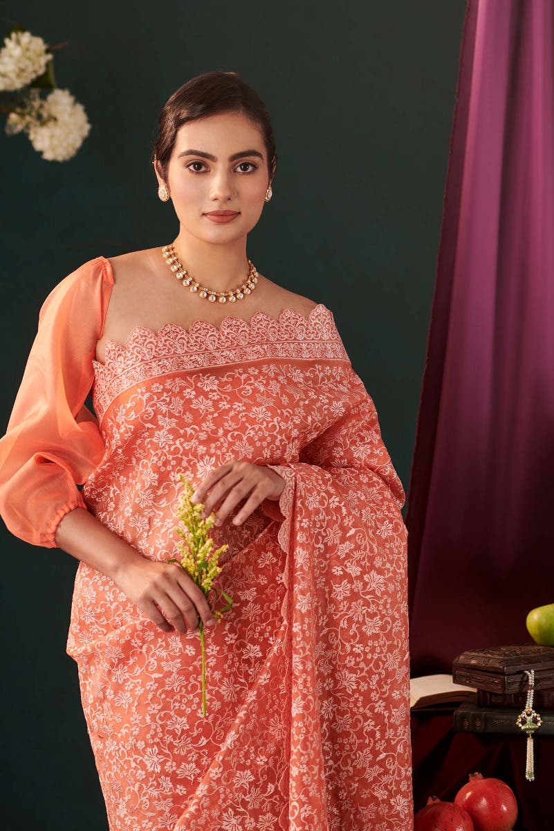 Iris waltz Orange floral design saree from Embroidered Romance Collection by Nalli