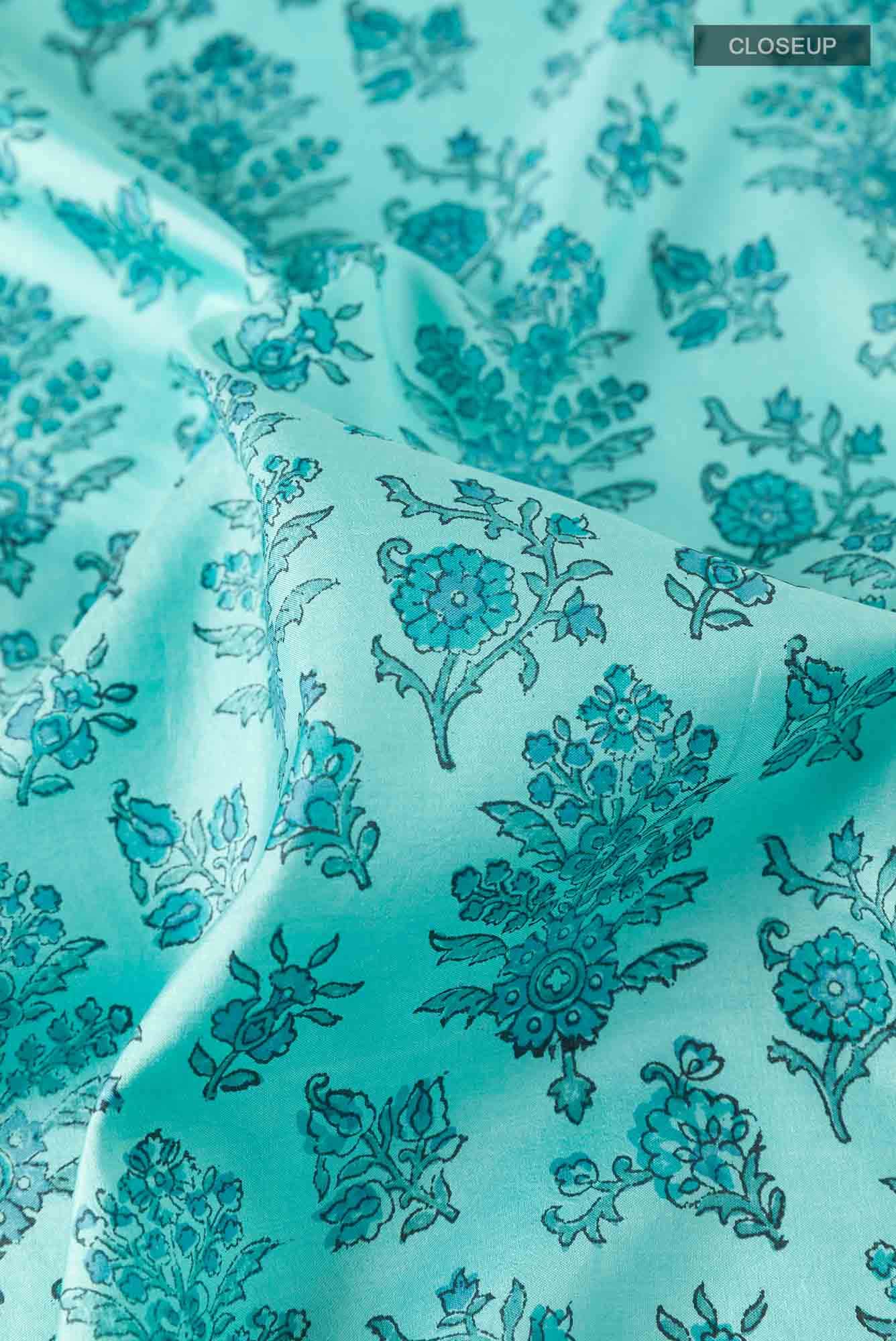Turquoise Printed Silk Saree