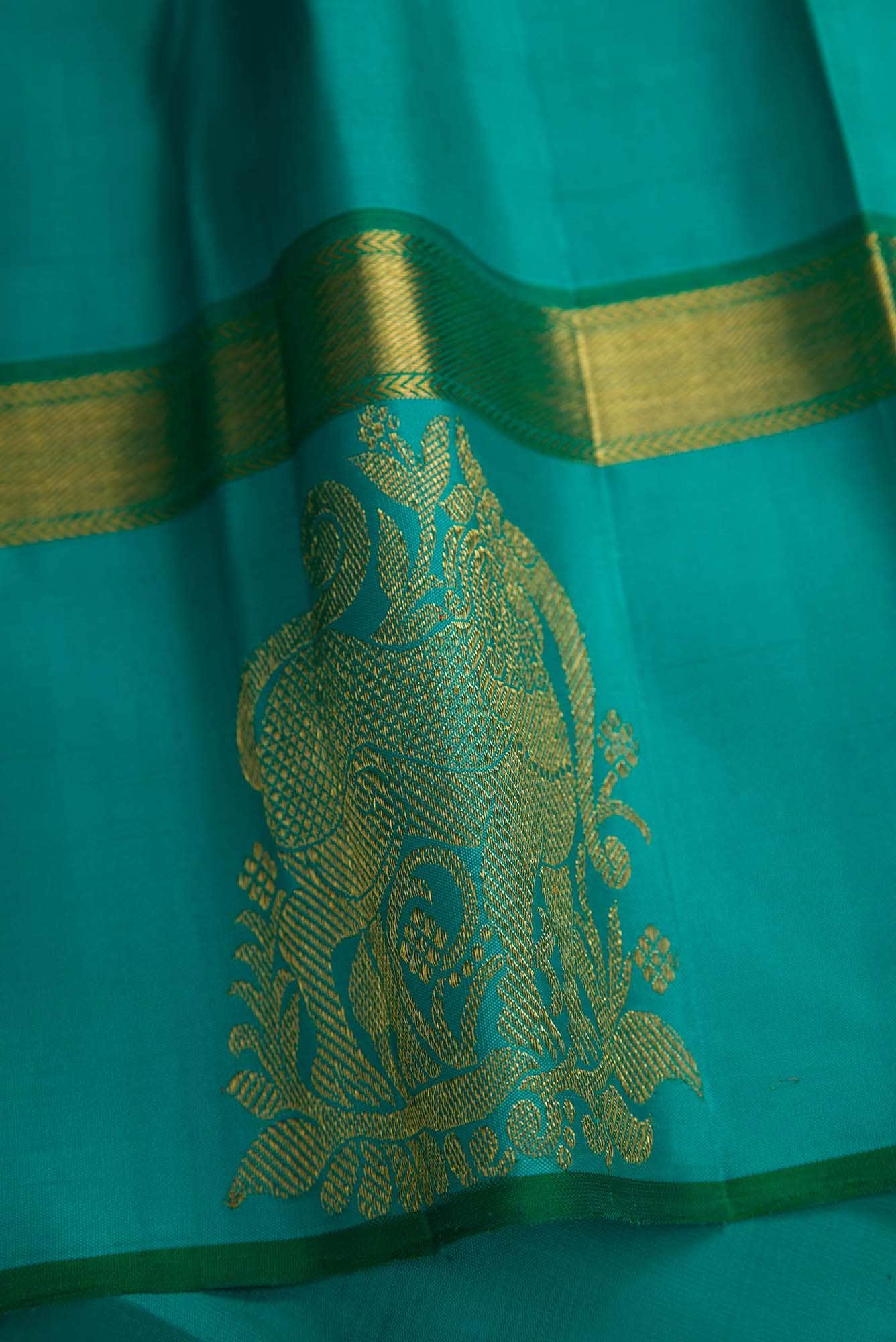 Pure Silk Pure Zari Peach Dual Tone Kanchipuram Saree