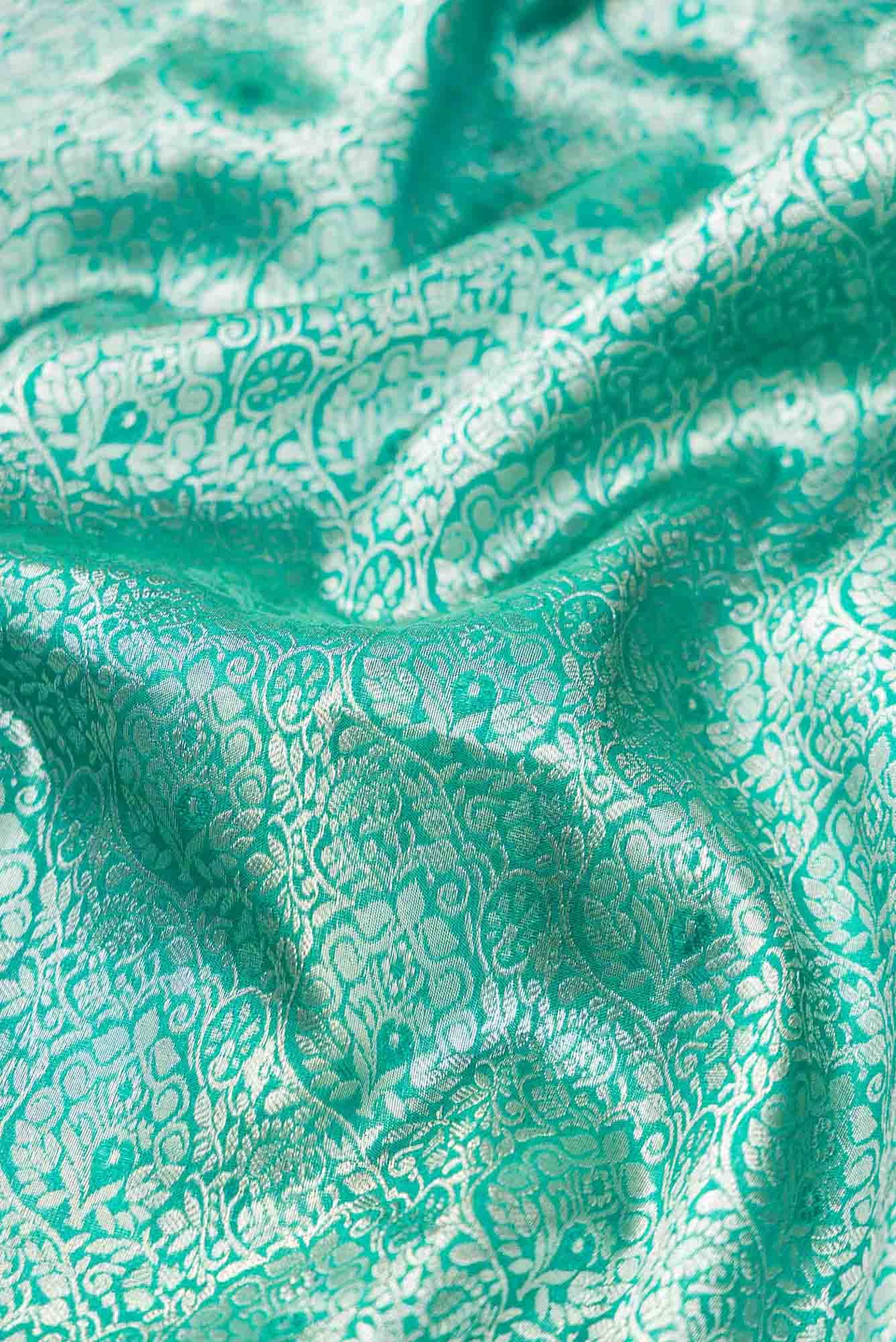 Pure Silk Pure Zari Sea Green Dual Tone Kanchipuram Tissue Saree