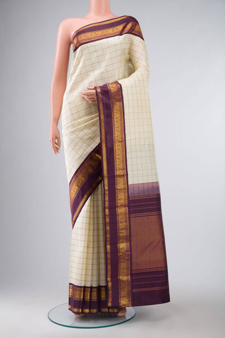 Pure Kanchipuram Silk Saree Cream with designs all over the body and Copper Zari Border main image 0