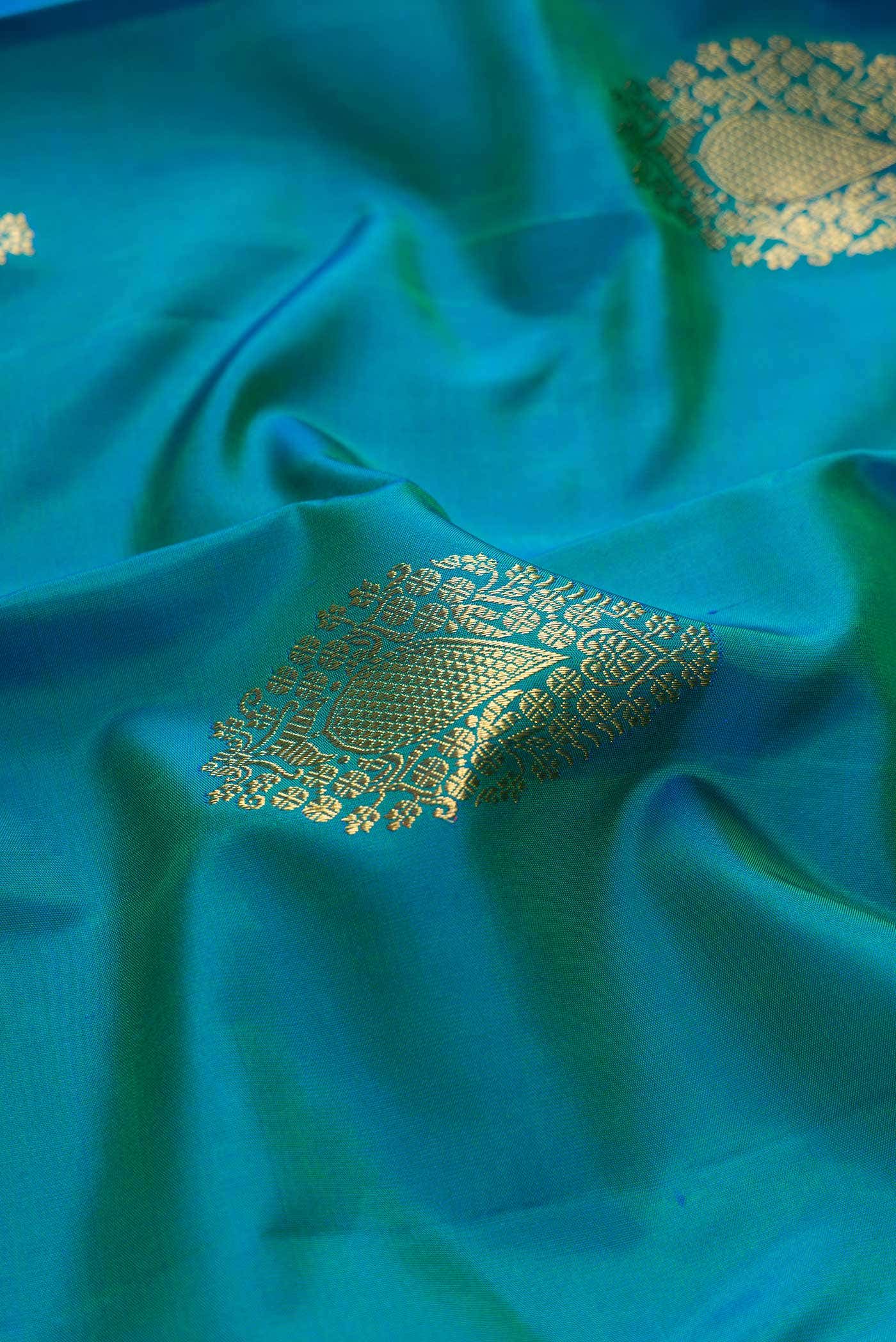 Pure Silk Pure Zari Teal Green Dual Tone Kanchipuram Saree