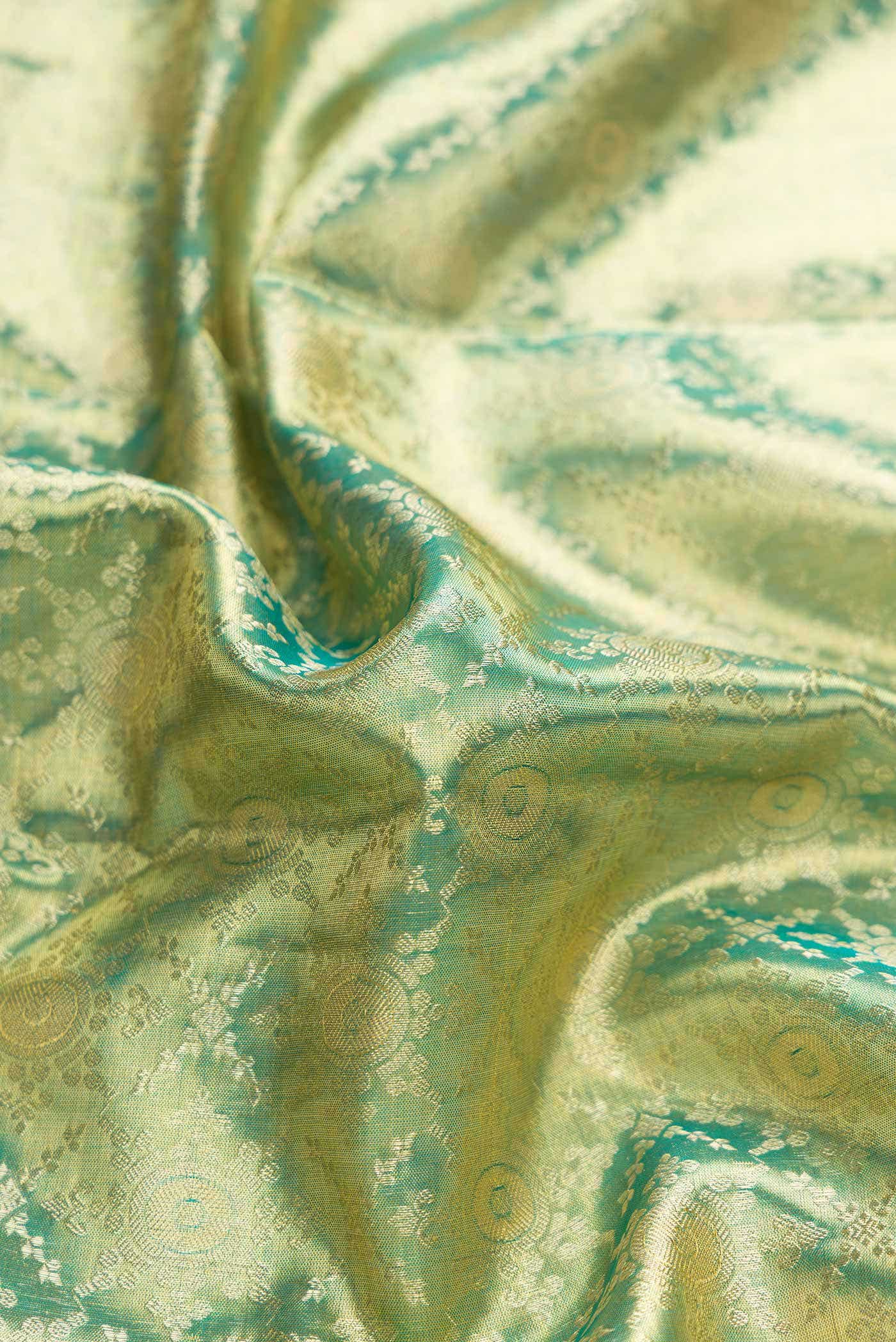 Green Dual Tone Kanchipuram Tissue Silk Saree