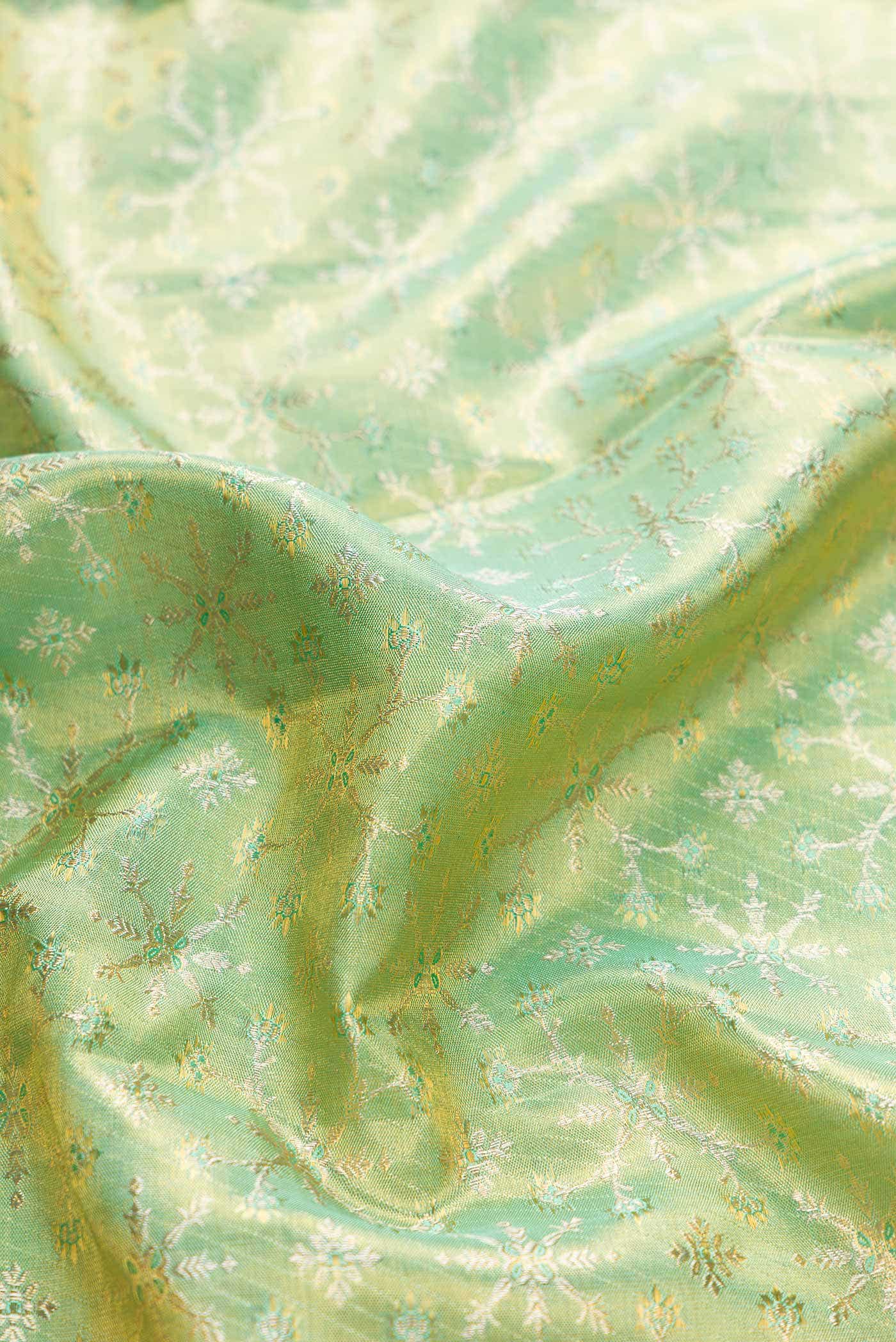 Green Dual Tone Kanchipuram Tissue Silk Saree