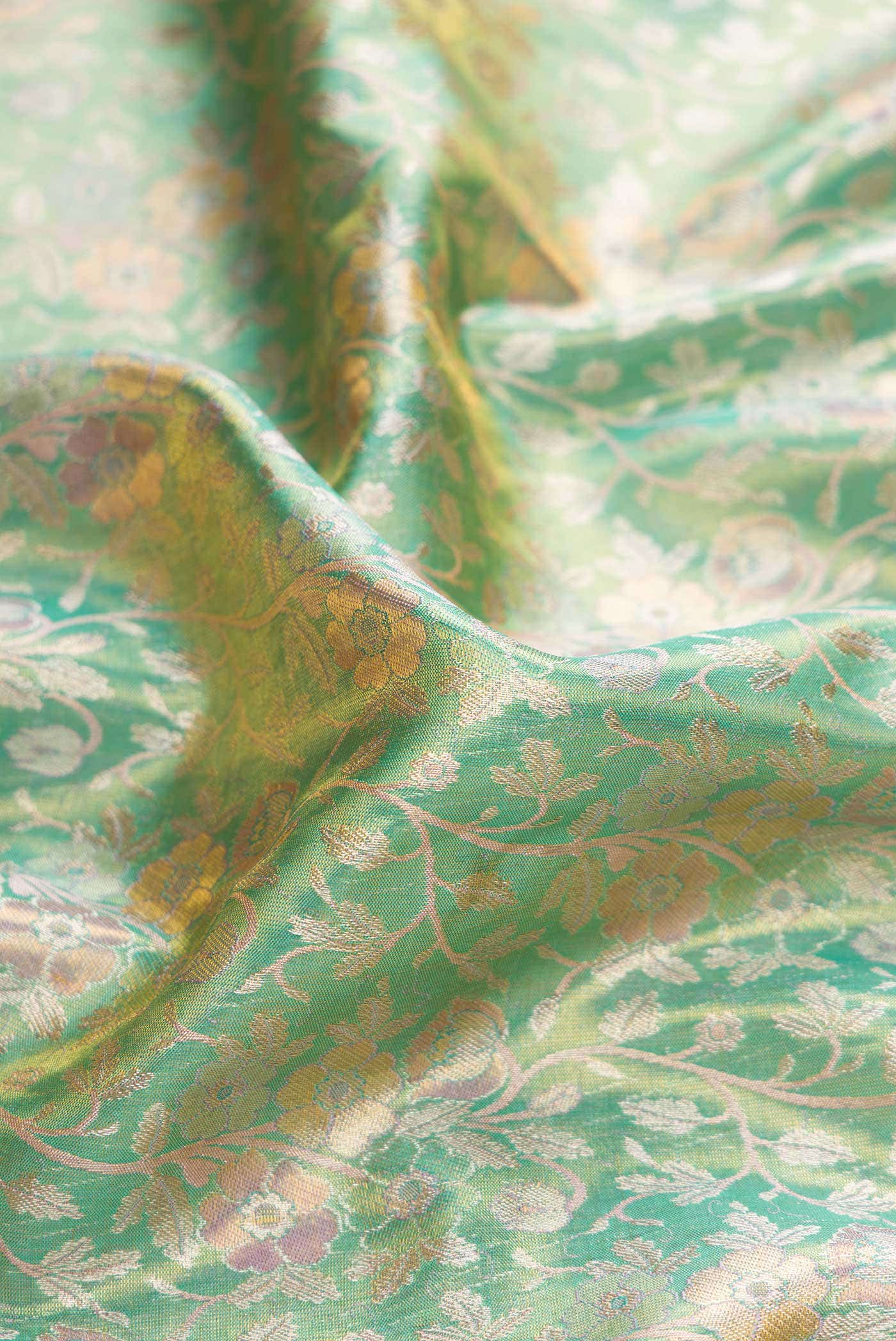 Green Dual Tone Kanchipuram Tissue Silk Saree