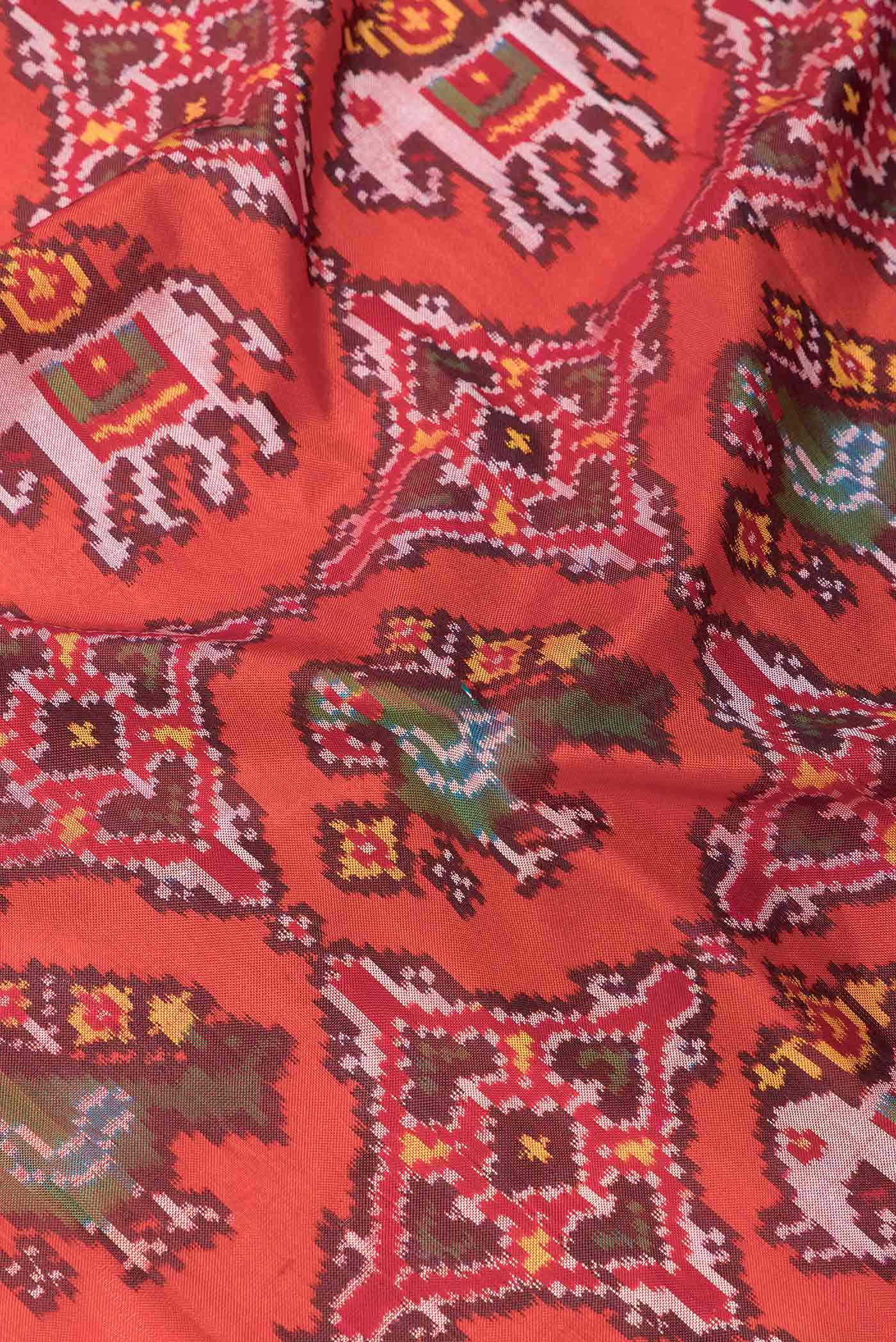 Pure Silk Pure Zari Orange Dual Tone Double Ikat Saree