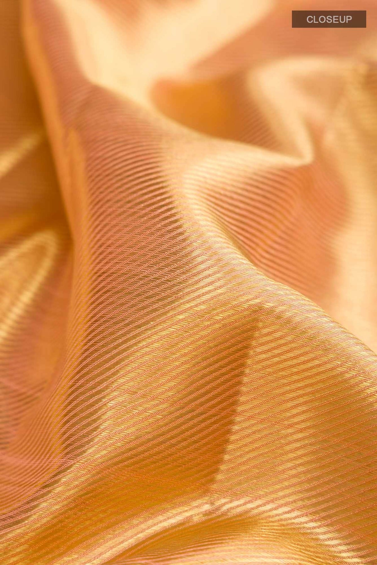 Gold with Peach Dual Tone Kanjivaram Tissue Silk Saree